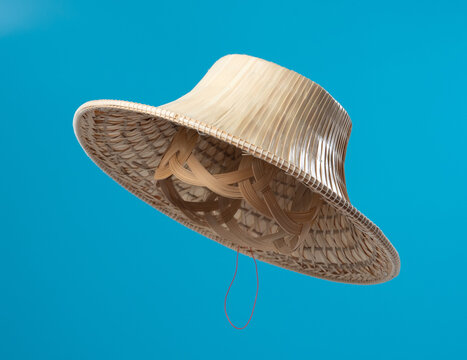 Asian conical bamboo hat for farmers on blue background