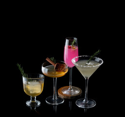 Colorful cocktail and Whiskey on the black background