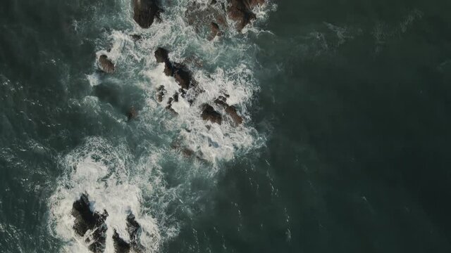 Aerial birds eye view of rocky coastline