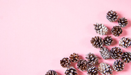 White cones on a pink background, space for text New Year or Christmas concept. Flat layout