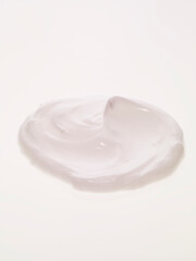 Cosmetic creams on white background
