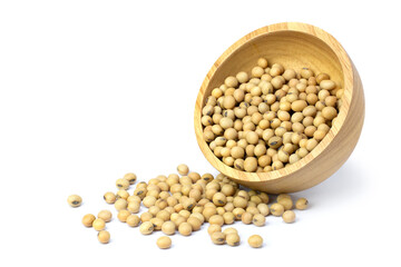 Soybeans in a wooden bowl isolated on white.