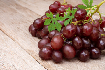 Grape cherries on a wooden table