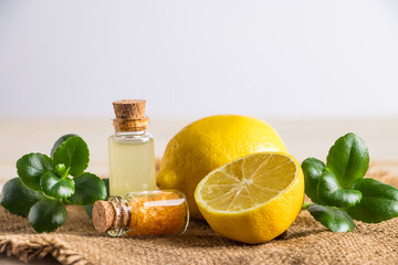 Product for spa and aromatherapy. Health care concept. Organic cosmetics with yellow lemon.