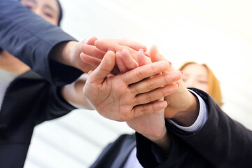 Obraz premium Asia Group of call center workers or Confident business team with headset in office.