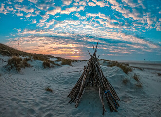 Beautiful virgin beach, with white sand and a beautiful sunset, in the Nord Sea, Langeoog, Germany
