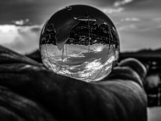 crystal globe on the palm