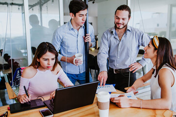 Latin Business teamwork having discussion in a workspace or coworking in Mexico Latin America