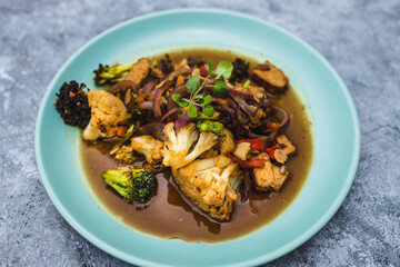 plant-based food, vegan mixed vegetable stew with tempeh