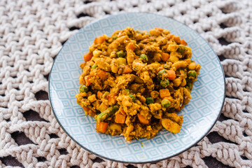 plant-based food, vegan garden vegetable and cannellini beans mix with cajun spices