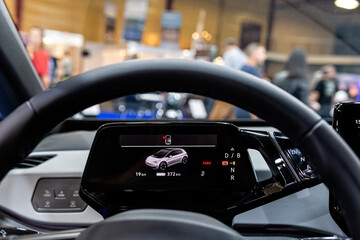 electric car interior digital dashboard with touchscreen functions