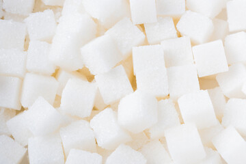 Sugar cube texture background sweet food ingredient, studio shot health high blood risk of diabetes, and calorie intake concept