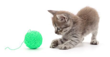 Kitten with ball of yarn. © olhastock