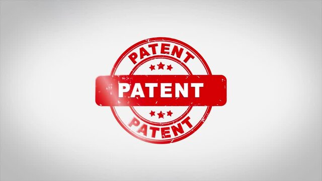Patent Signed Stamping Text Wooden Stamp Animation. Red Ink on Clean White Paper Surface Background with Green matte Background Included.
