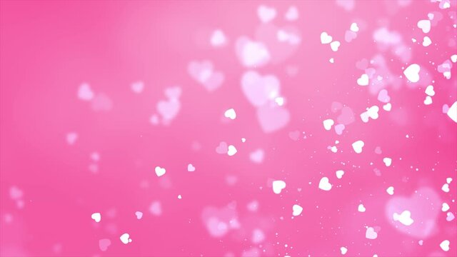 Blowing and disappearing small Pink hearts flowing on white background Seamless 4K loop video animation. Like Heart particles. Network and social media concept. Valentines Day, Wedding Mother's Day