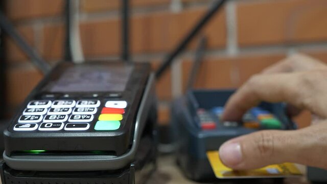 Customer using credit card for payment, credit card payment service.