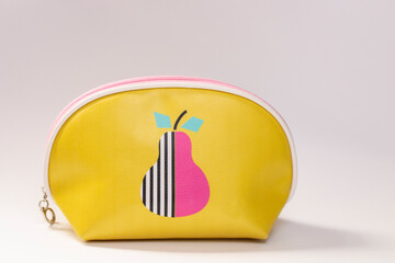 one yellow cosmetic bag for girls