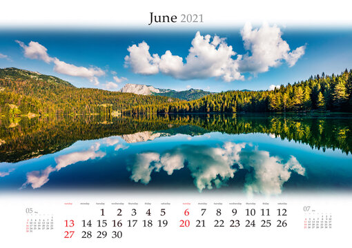 Calendar June 2021, B3 size. Set of calendars with amazing landscapes. Deep blue sky and fluffy clouds reflected in Black Lake (Crno Jezero), Durmitor National Park, Montenegro.