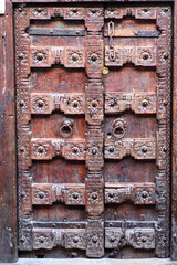 old door on old wall
