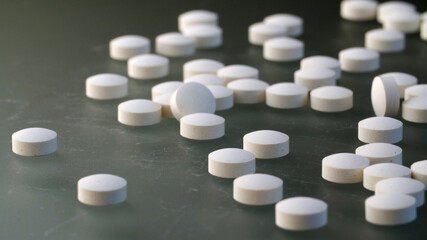 White pills on the table