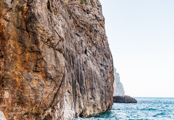 Sunny day over the rocks and the blue water in Sa Calobra, Palma de Mallorca, Balearic Islands, Spain