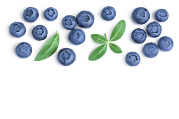 fresh ripe blueberry with leaves isolated on white background with clipping path . Top view with copy space for your text. Flat lay pattern