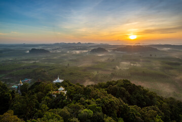 Fototapeta na wymiar Landscape of beautiful sunrise at Khao Na Nai Luang Dharma Park in Thailand