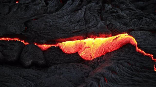 Pāhoehoe lava flows from Puʻu ʻŌʻō volcanic cone on Kīlauea volcano's East Rift Zone in Hawaiʻi. Shield volcano, Hawaii hotspot, Pacific plate. Basaltic / Basalt