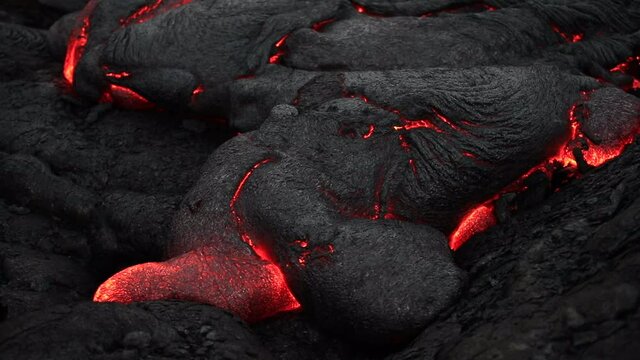 Pāhoehoe lava flow from the Pu&lsquo;u&lsquo;ō&lsquo;ō Eruption in February, 2018. Kīlauea is an active shield volcano in the Hawaiian Islands. Lava is molten or partially molten rock (magma) .	