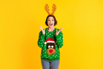Photo crazy girl in funny deer decor jumper impressed jolly holly x-mas christmas theme party event news scream wear horns headband denim jeans isolated bright shine color background