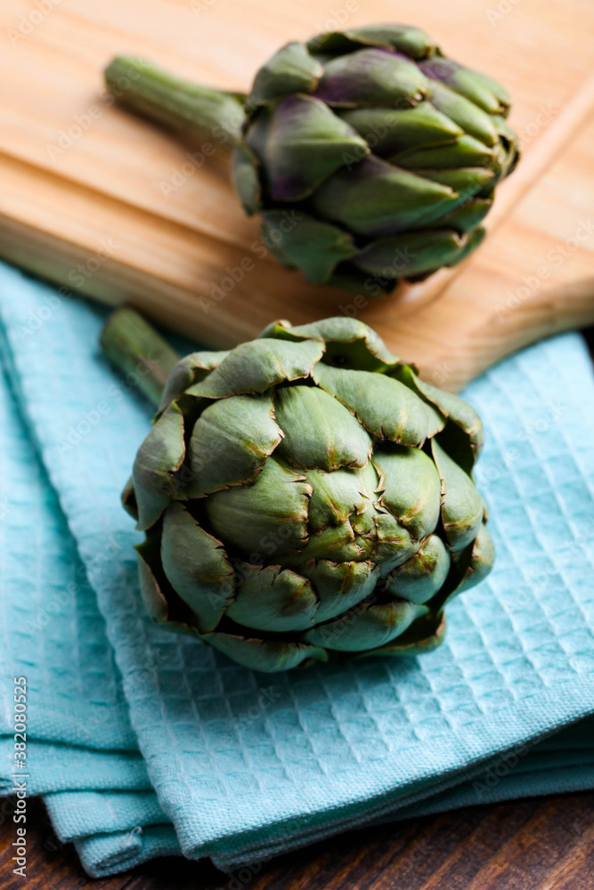 Wall mural two fresh artichokes