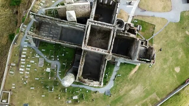 Flight over Rock of Cashel ruin in Ireland. Look inside from above. 4K