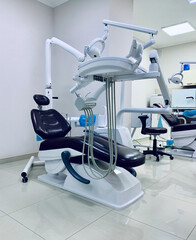 Special equipment for a dentist. Modern dentist's chair in a medical room.