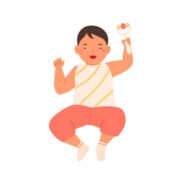 Cheerful Cute Baby Lying Holding Rattle Vector Flat Illustration. Funny Toddler Smiling Shaking Toy Isolated On White. Adorable Happy Child Playing Noisy Plastic Plaything With Handle Top View