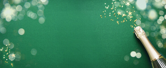 Christmas champagne bottle and confetti stars