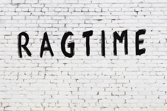 Inscription Ragtime Painted On White Brick Wall