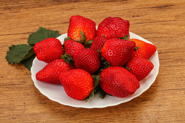 Ripe sweet strawberry with leaf