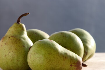 Pears mini on wooden chopping board