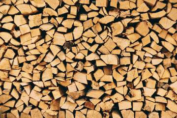 Wooden natural logs. Brown log close-up. Prepared firewood.