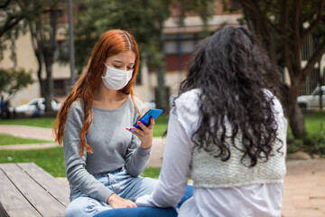 Shallow focus shot of young females during the COVID-19