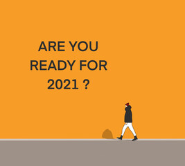 Man walking on street with motivation for Start to new year 2021 plans, goals, objectives and Word on the wall "Are you ready for 2021"