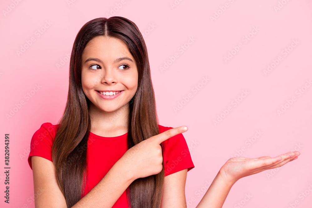 Sticker Photo of kid girl hold hand point index finger copyspace wear red t-shirt isolated over pastel color background