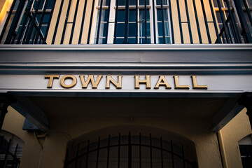 Golden town hall sign at local government office