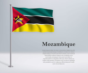 Waving flag of Mozambique on flagpole. Template for independence day