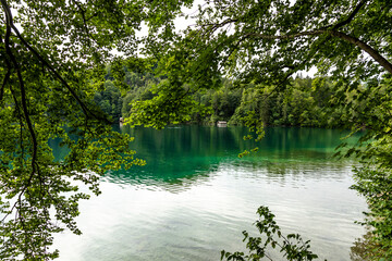 Beautiful view over the lake called Alpsee next to the castle Neuschwanstein and Hohenschwangau in...