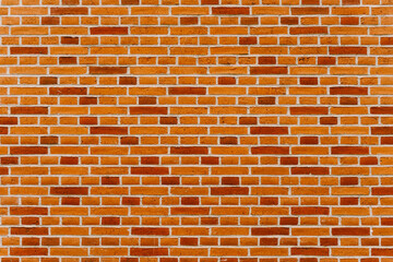 Close-up texture of new brick wall and yellow and brown bricks.