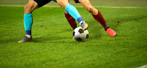 Obraz premium banner of soccer game players fighting for football