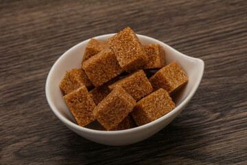 Cane sugar cubs in the bowl