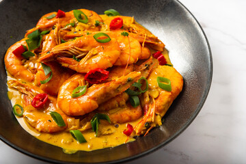 Plate of  Shrimps in curry sauce  