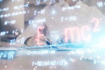 Science formula hologram over woman's hands taking notes background. Concept of study. Double...